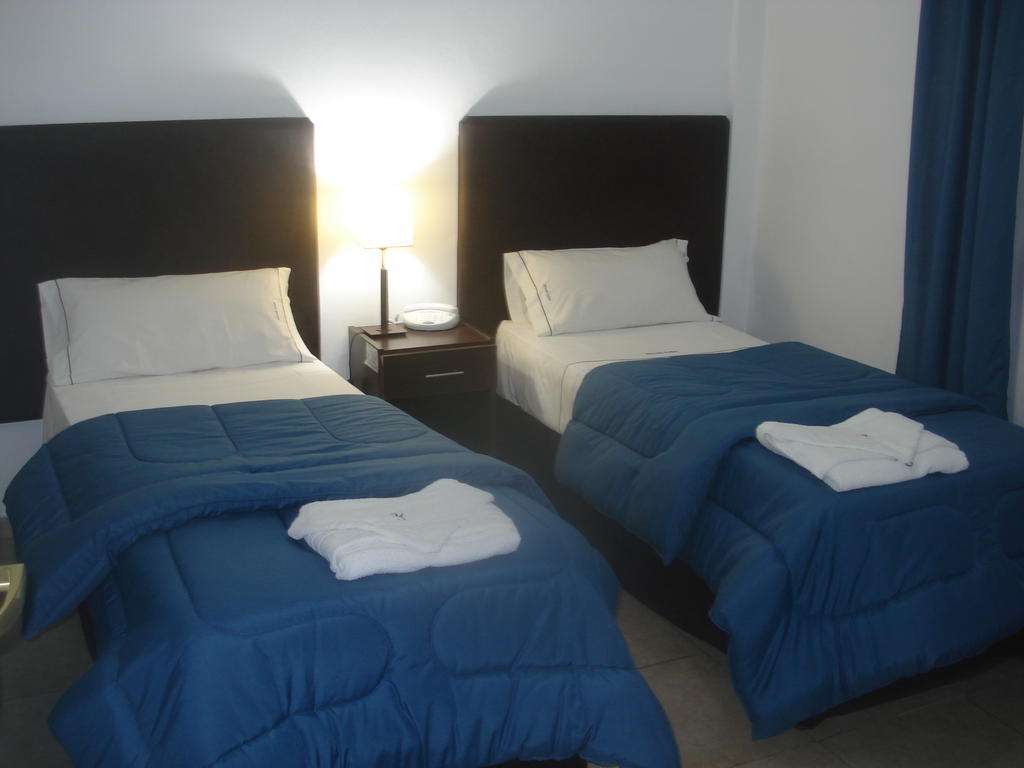 Morada Suites Campana Chambre photo