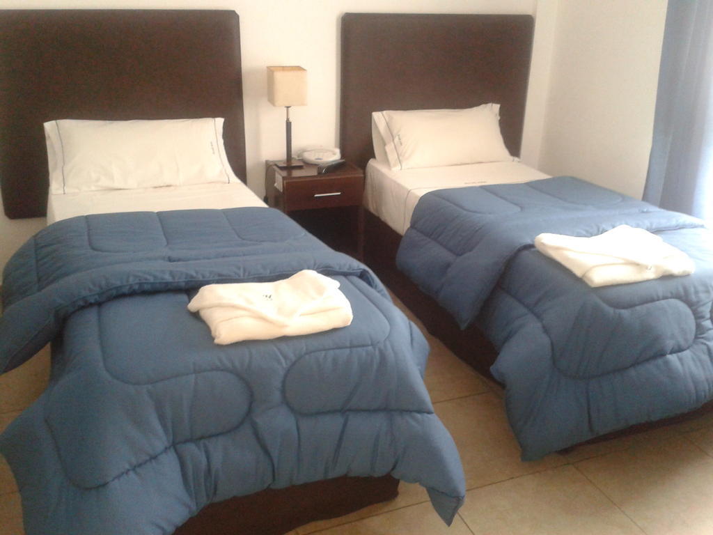 Morada Suites Campana Chambre photo